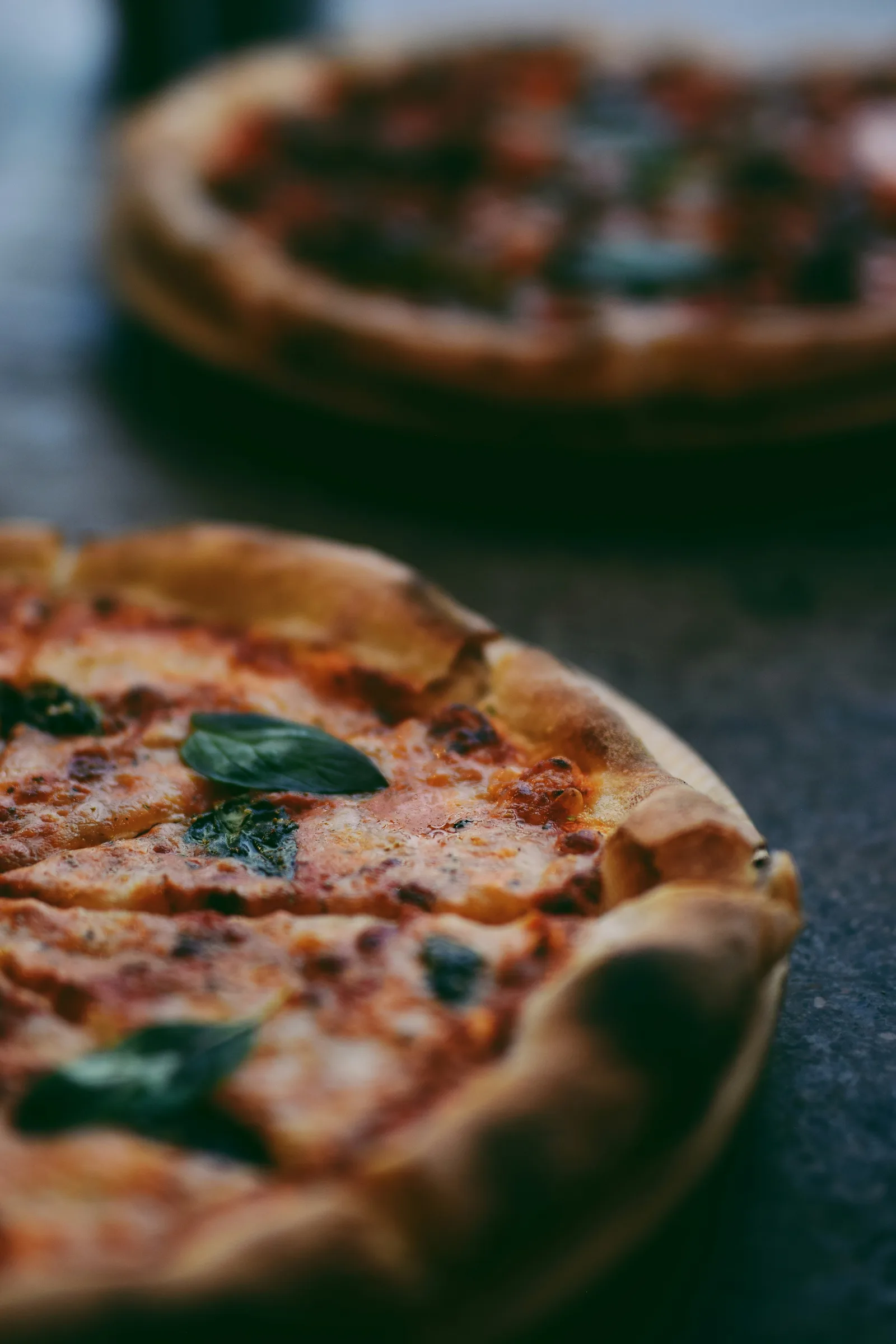 Fresh pizza ingredients — San Marzano tomatoes, mozzarella, and basil — sourced for quality